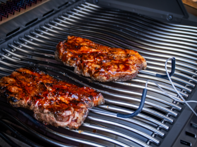 Pork shoulders on a BBQ
